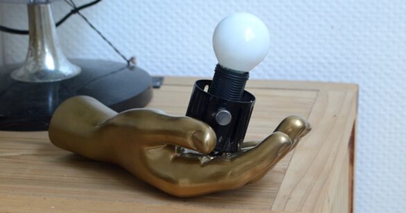 upcycling, a wooden dresser with a lamp and a globe on top